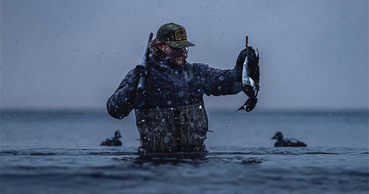 Duck hunter with harvest. Photo by Weatherby Inc.