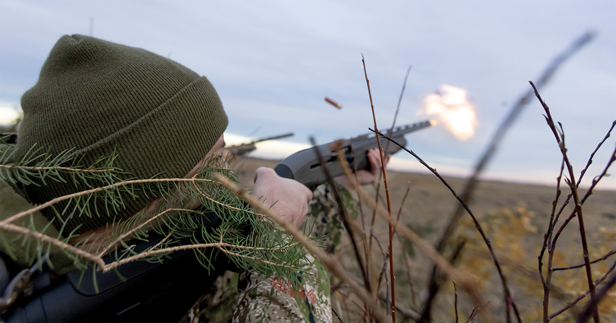 Hunter taking aim. Photo by Doug Steinke