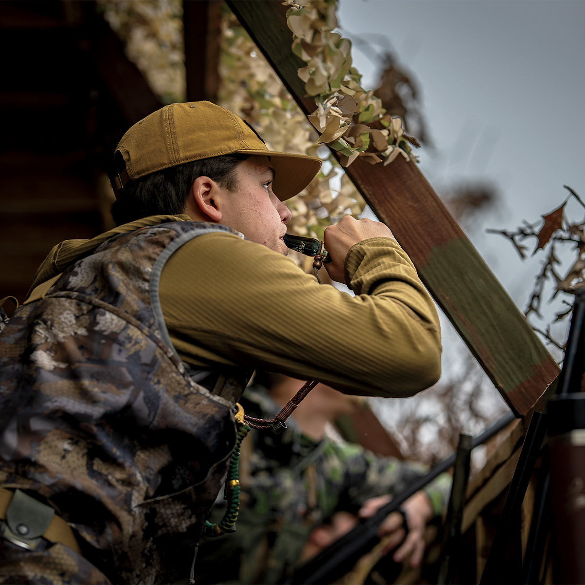 Waterfowl hunter calling, Photo by Cason Short/byersfarm.com